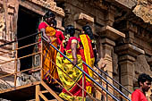 The main temple, in front an open pavilion shelters a huge monolithic Nandi. Pilgrims visiting the temple. 